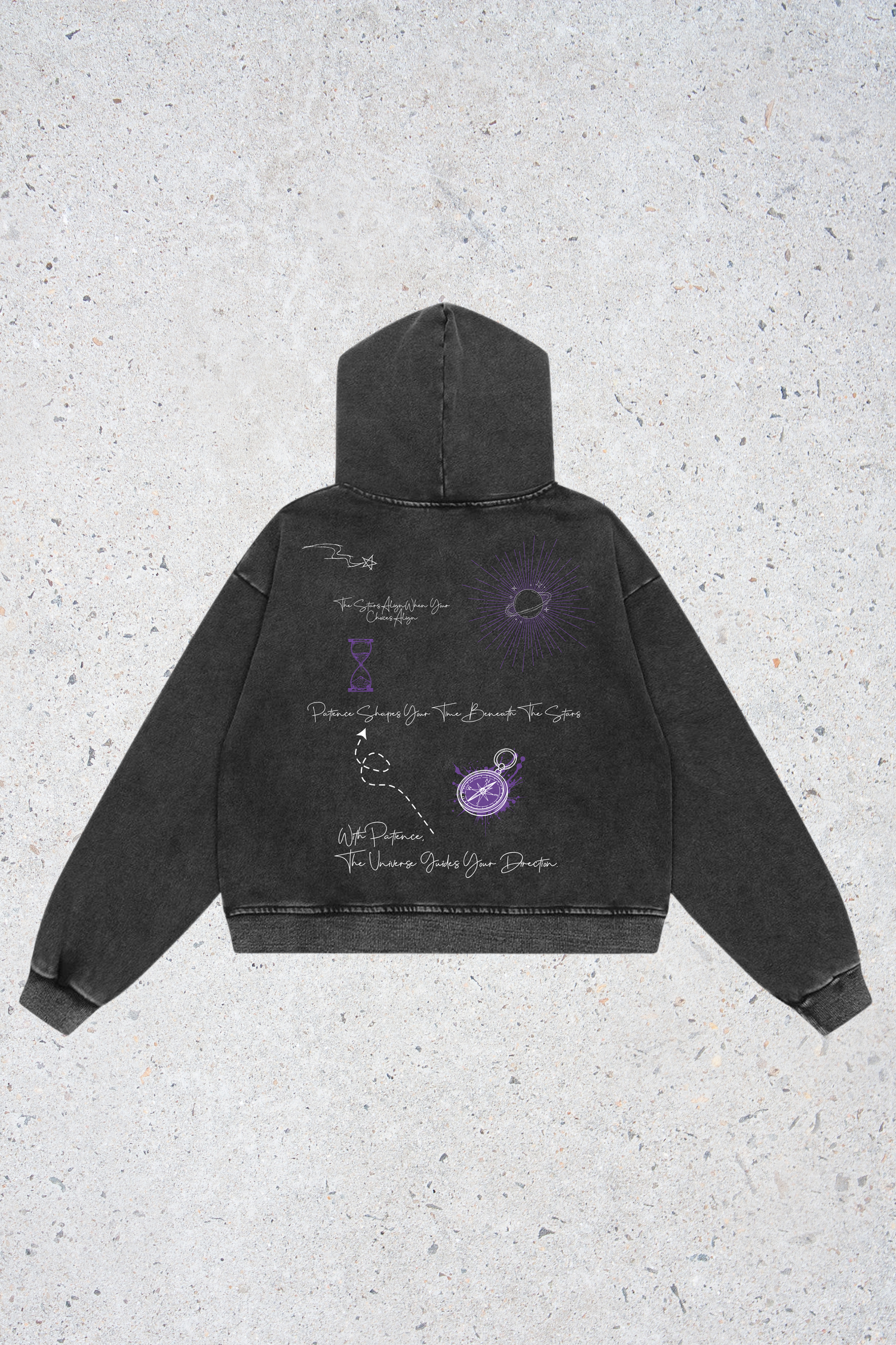 Black hoodie with purple graphics on a textured gray background
