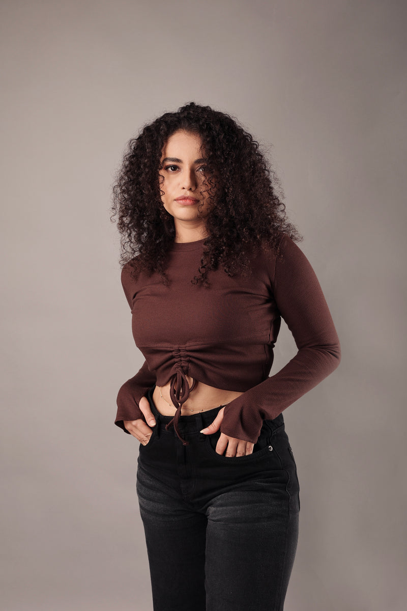 Close-up detail of neckline and fabric – brown cropped streetwear top