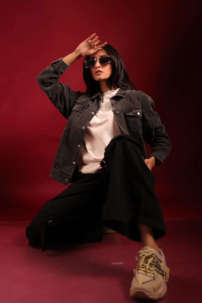 Model wearing grey denim streetwear jacket by Psypher India
