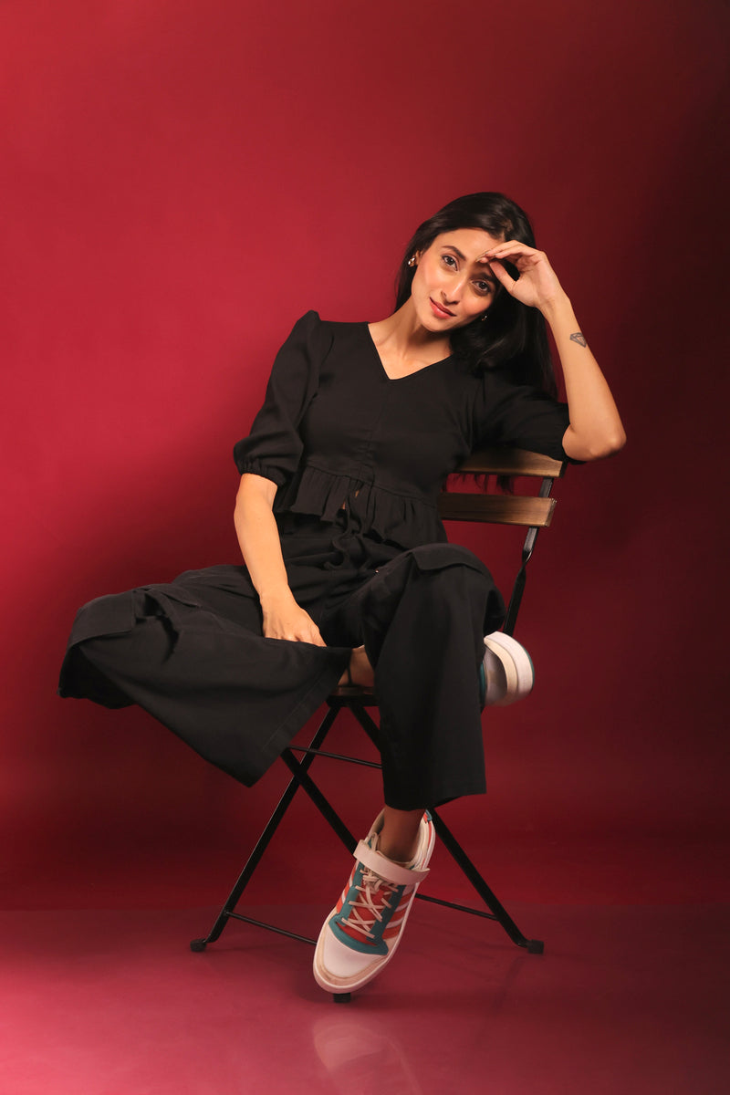 Lifestyle look with black streetwear cropped top styled in India