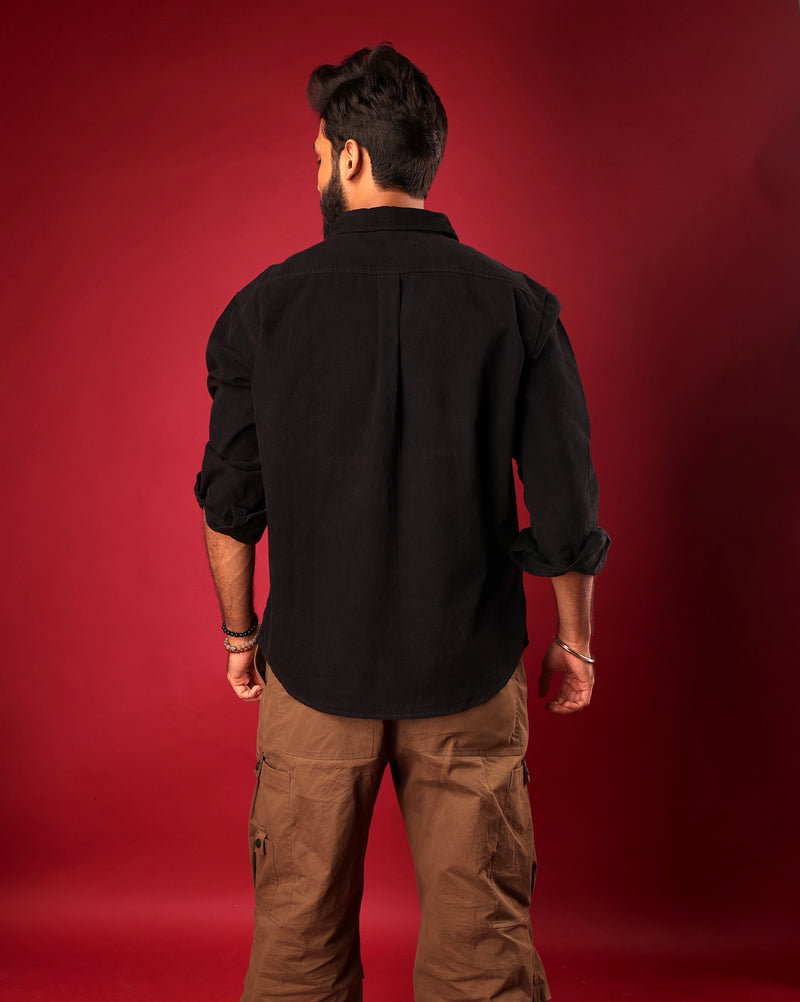Back view of Psypher black corduroy shirt for Indian streetwear looks