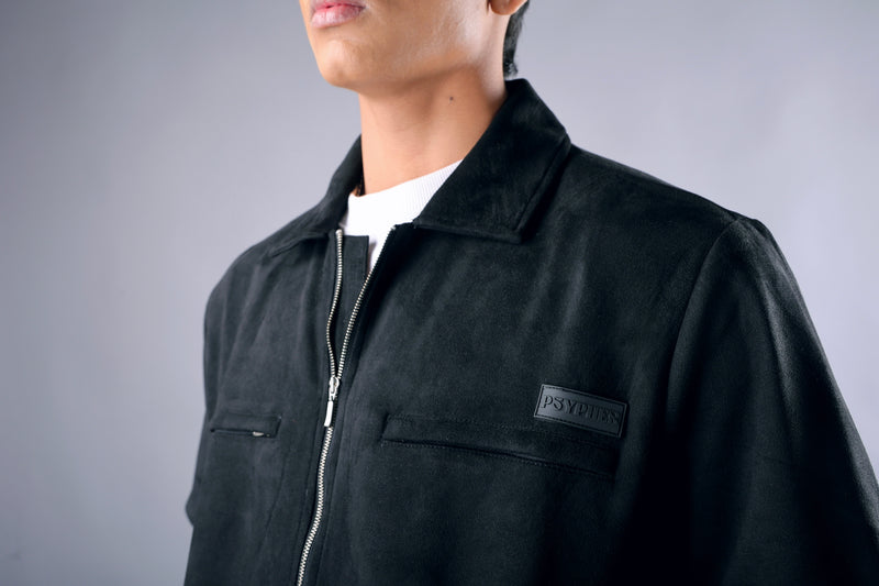 Close-up of suede fabric and logo – black streetwear jacket India