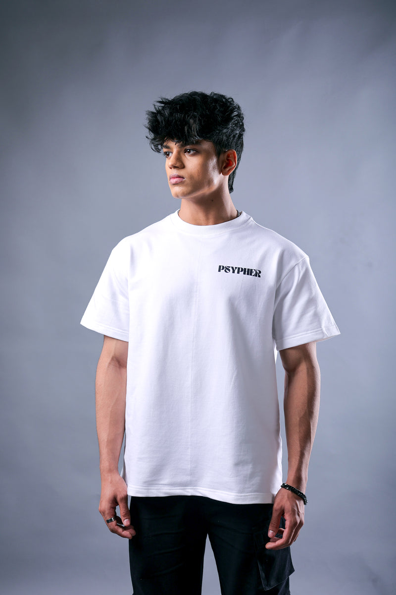 Lifestyle shot of white motivational oversized streetwear tee India